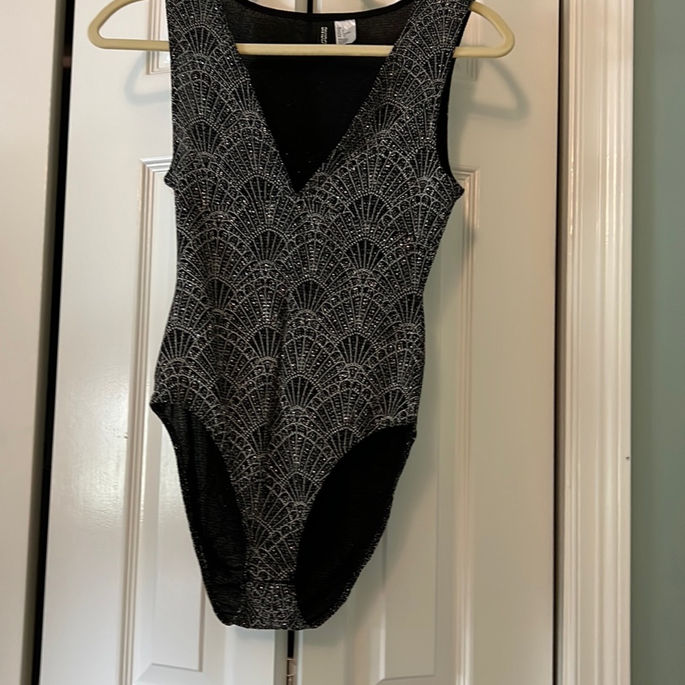 Silver sequined tank body suit. Like new. Worn once